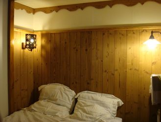 Appartement en location saisonnière à Valmorel : chambre avec lit double